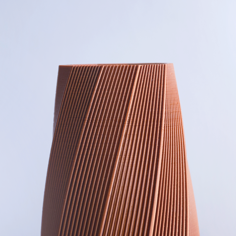 Brown textured 3d print vase on a light purple background
