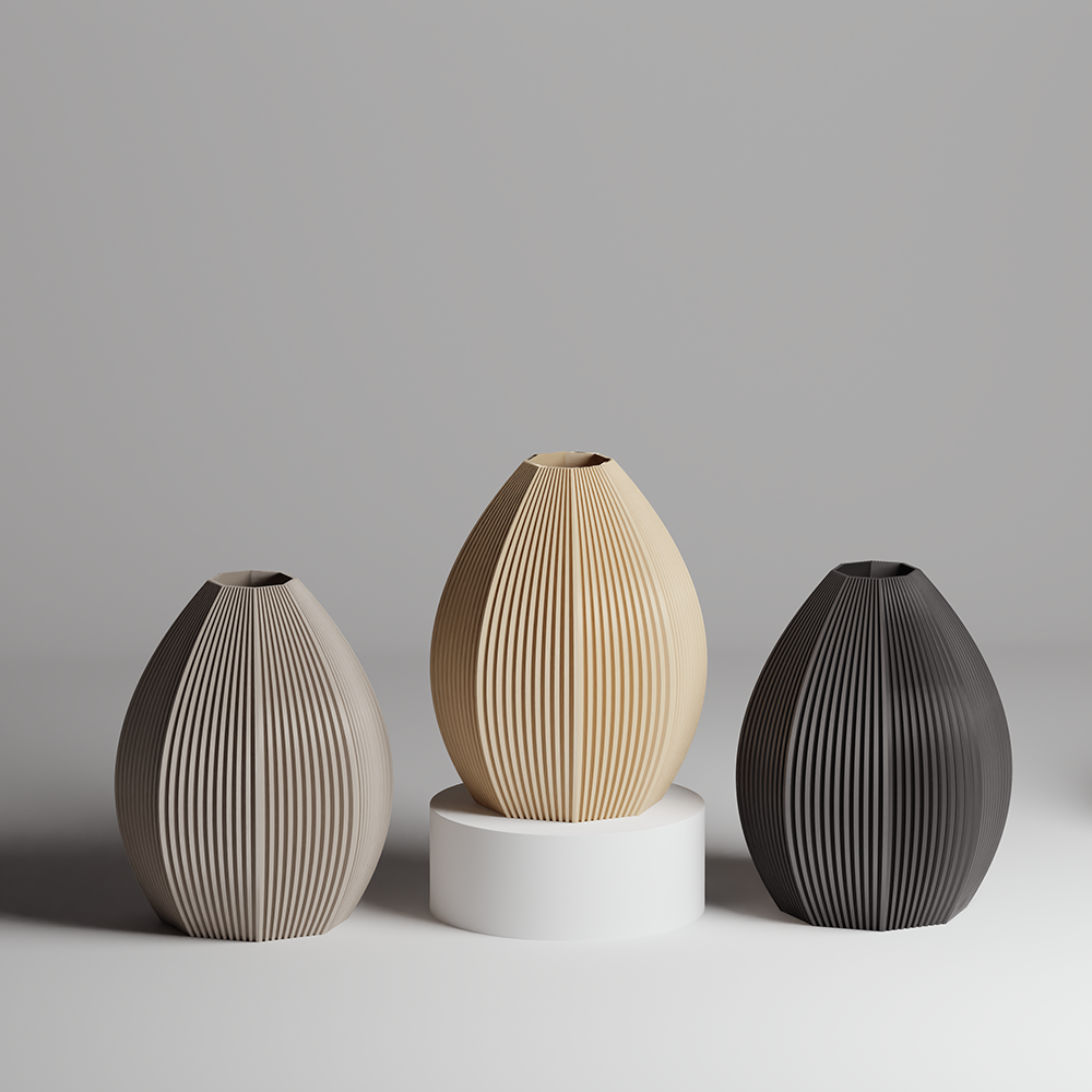 Three textured vases in beige, brown, and black on a gray background