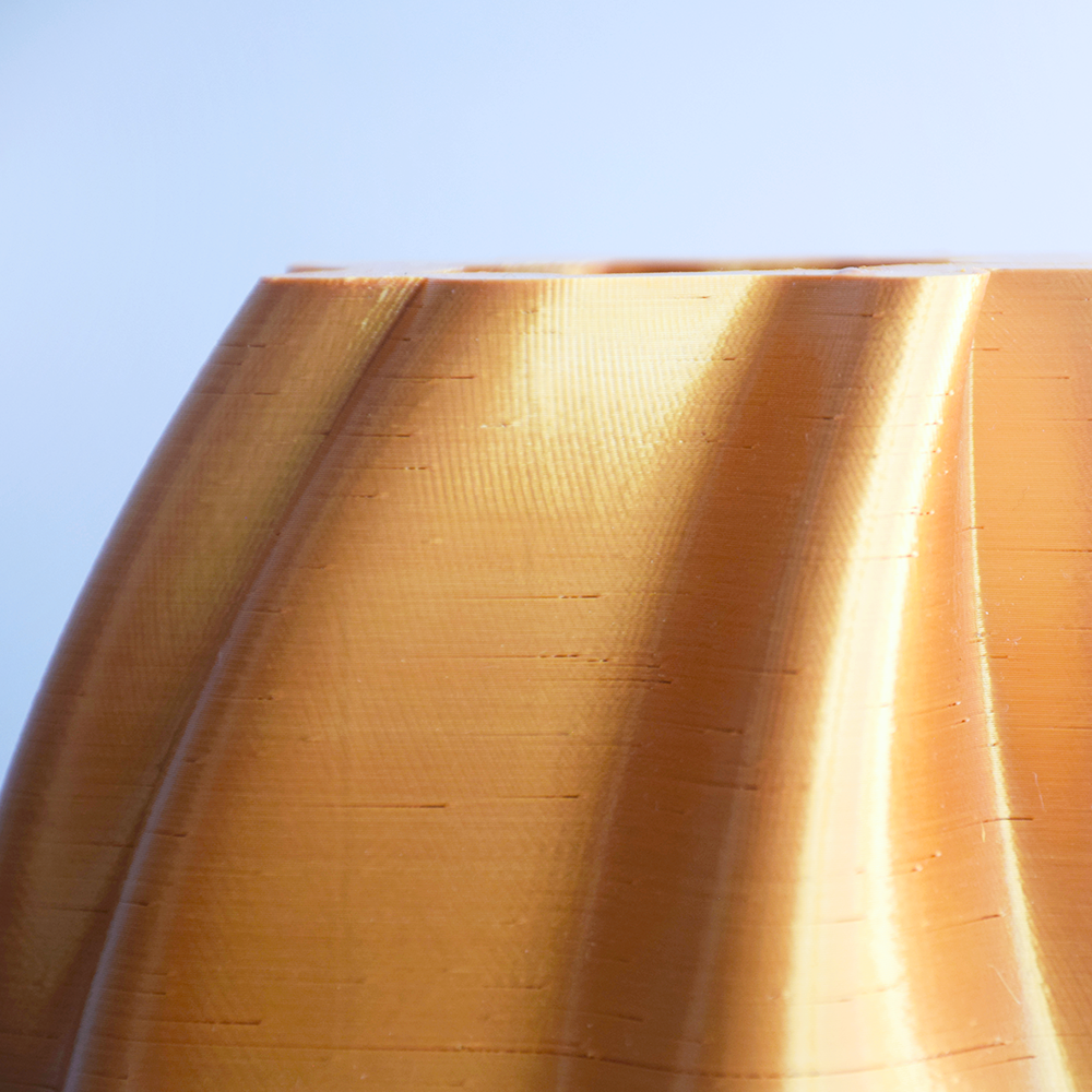 Close-up of a 3d printed surface with a blue sky background