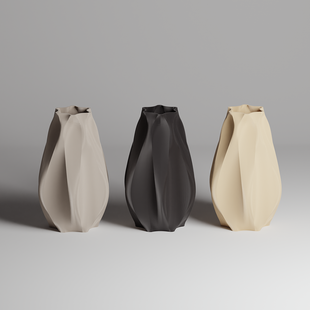 Three folded paper vases in beige, black, and beige on a gray background
