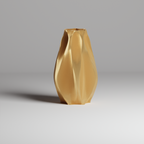 Gold geometric vase on a gray background