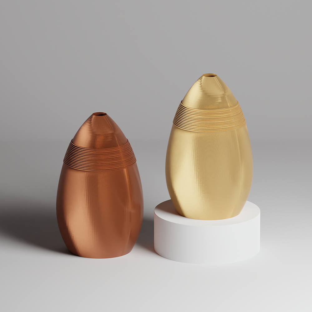 Two metallic vases, one copper and one gold, on a gray background