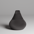 Black textured vase on a gray background