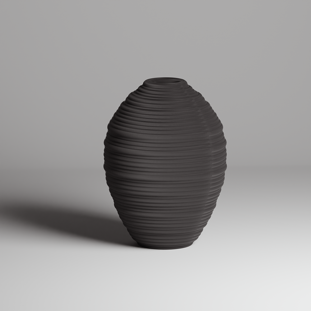 Dark gray textured vase on a light gray background