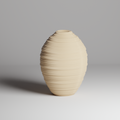 Beige ceramic vase with textured surface on a gray background