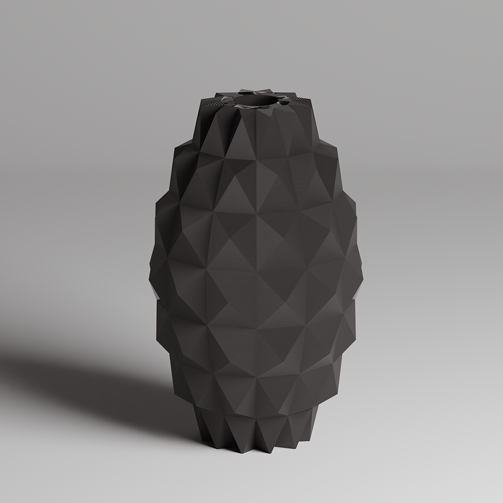 Black geometric vase on a gray background