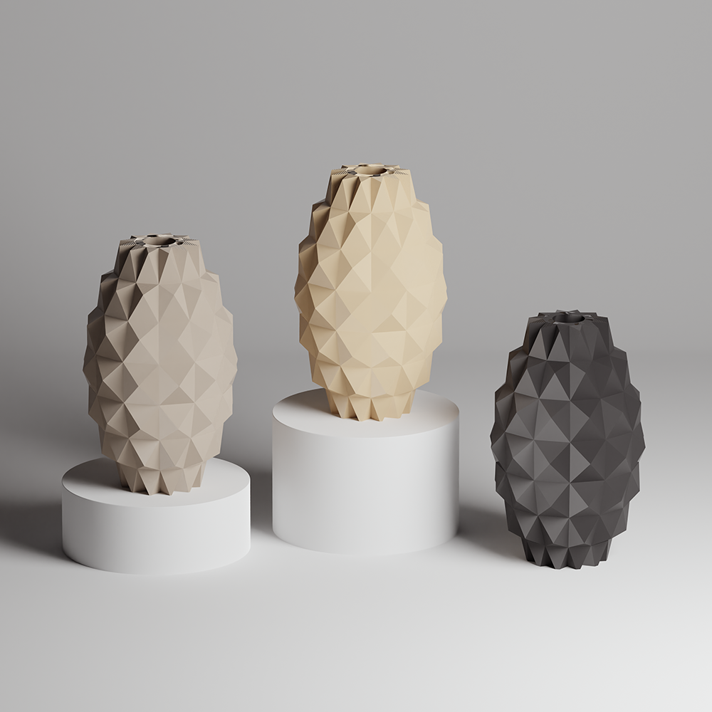 Three geometrically patterned vases on white stands against a gray background