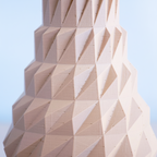 Geometric architectural structure with a blue sky background