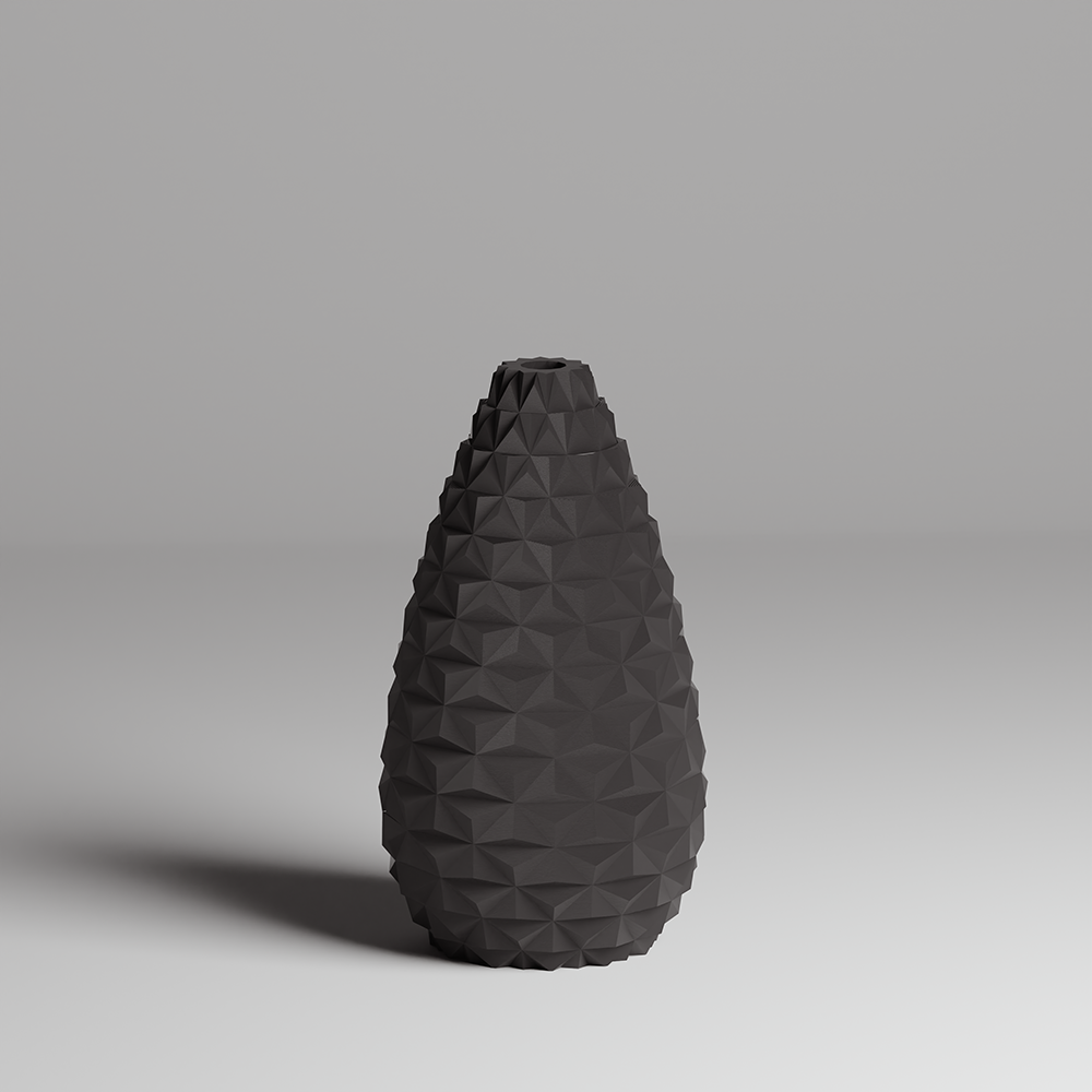 Black geometric-patterned vase on a gray background
