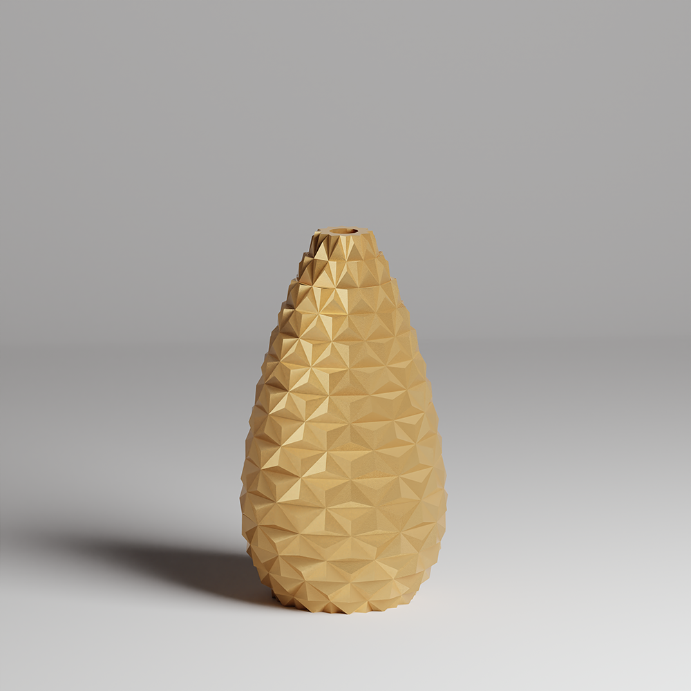 Gold geometric-patterned vase on a gray background